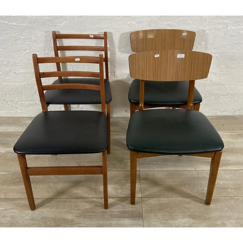 94 - Four mid 20th century beech and vinyl dining chairs, two black vinyl and two teak effect and green v... 