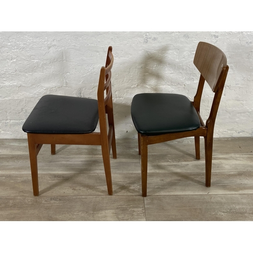 94 - Four mid 20th century beech and vinyl dining chairs, two black vinyl and two teak effect and green v... 