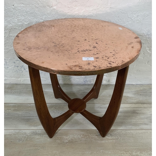 4 - A mid 20th century teak and copper topped circular side table - approx. 53cm high x 54cm diameter