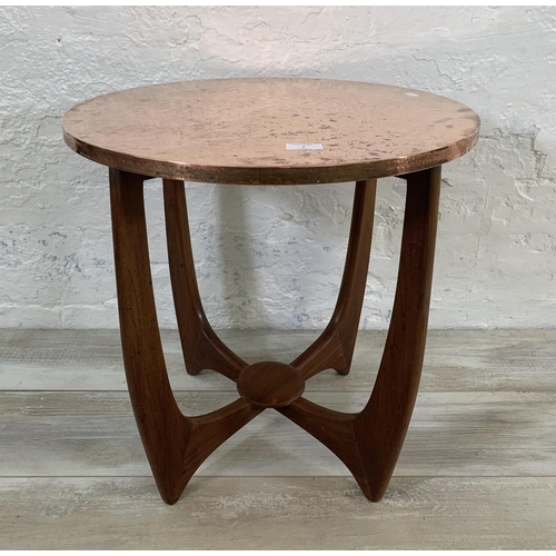 4 - A mid 20th century teak and copper topped circular side table - approx. 53cm high x 54cm diameter