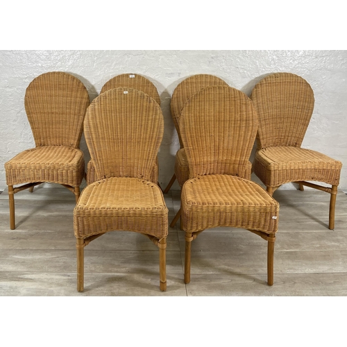 96 - Six wicker dining chairs