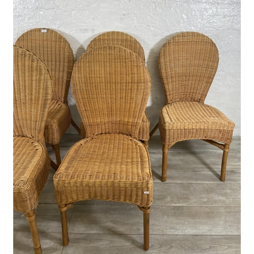 96 - Six wicker dining chairs