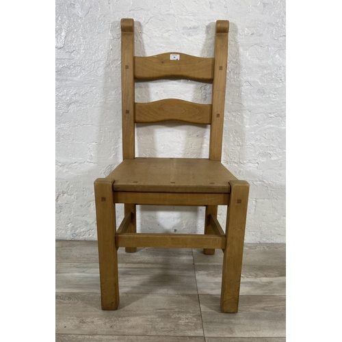 98 - Six beech ladder back dining chairs