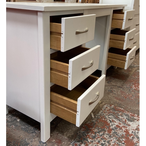 41 - A modern white painted oak dressing table - approx. 75cm high x 135cm wide x 43cm deep