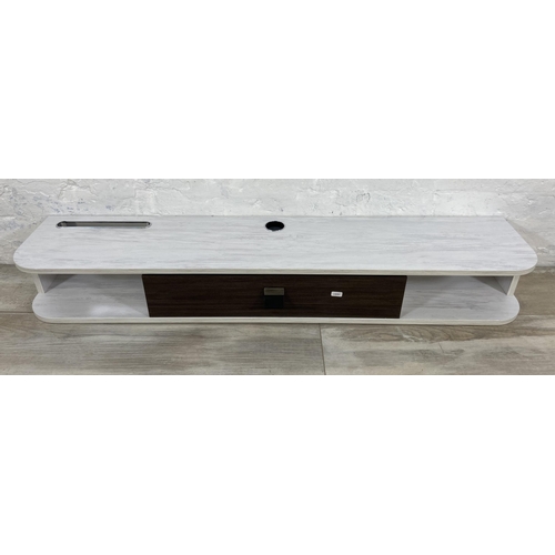 43 - A modern white laminate and wood effect wall mountable media unit - approx. 16cm high x 120cm wide x... 