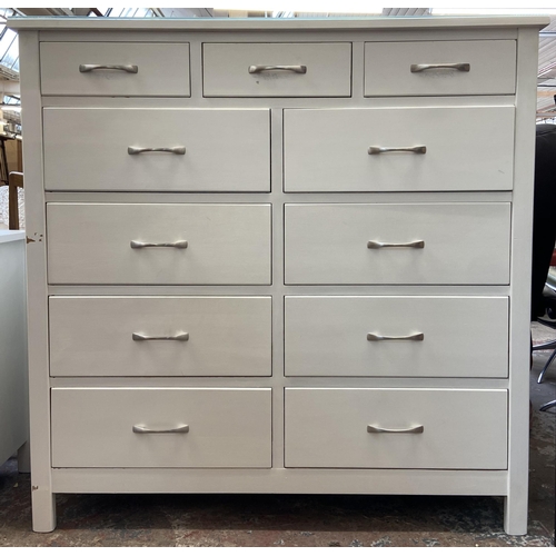 44 - A modern white painted oak chest of drawers - approx. 128cm high x 128cm wide x 43cm deep