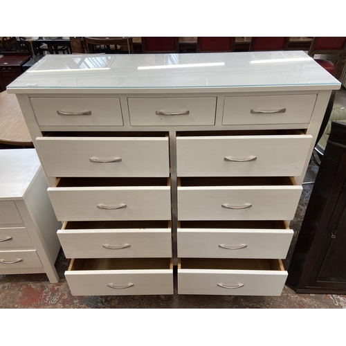 44 - A modern white painted oak chest of drawers - approx. 128cm high x 128cm wide x 43cm deep