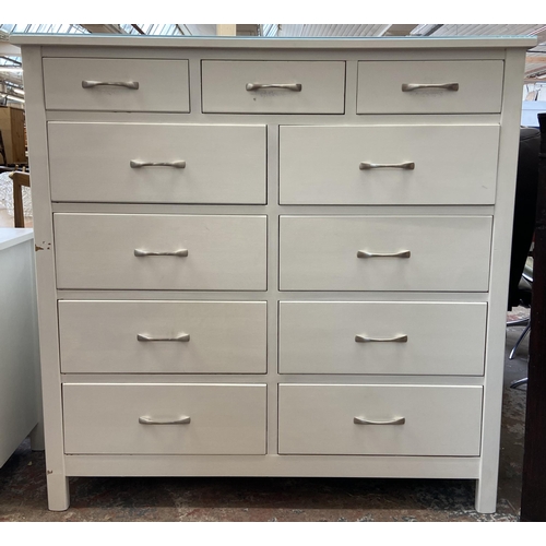 44 - A modern white painted oak chest of drawers - approx. 128cm high x 128cm wide x 43cm deep