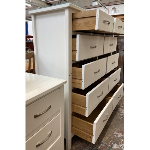 44 - A modern white painted oak chest of drawers - approx. 128cm high x 128cm wide x 43cm deep