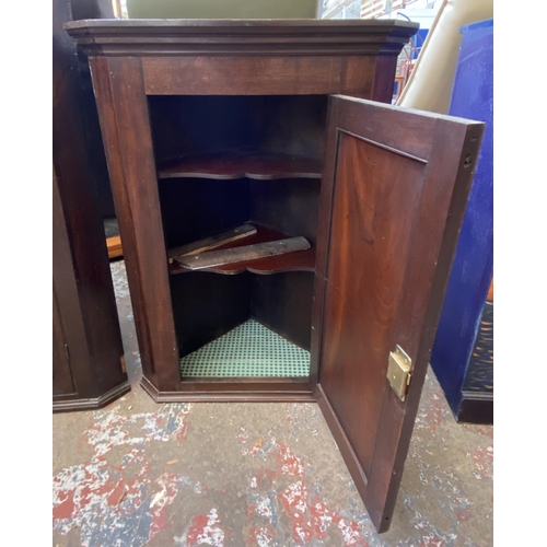 45 - Two George III wall mountable corner cabinets, one mahogany - approx. 84cm high and one oak - approx... 