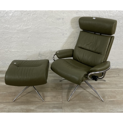 48 - An Ekornes Stressless Tokyo green leather and chrome plated swivel reclining armchair and footstool