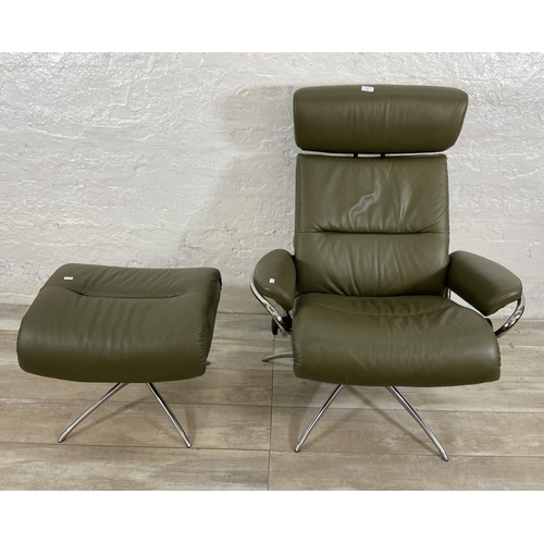 48 - An Ekornes Stressless Tokyo green leather and chrome plated swivel reclining armchair and footstool