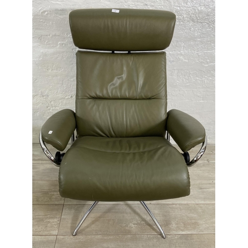 48 - An Ekornes Stressless Tokyo green leather and chrome plated swivel reclining armchair and footstool