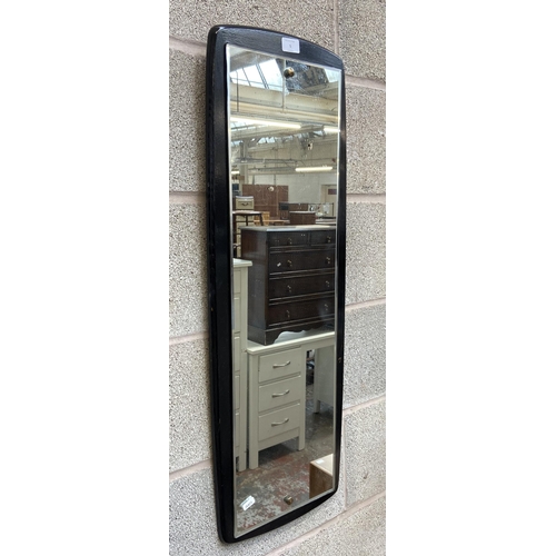 5 - A mid 20th century ebonised framed wall mirror - approx. 90cm high x 32cm wide