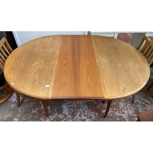 50 - A G Plan Fresco teak extending dining table and four chairs - approx. 73cm high x 121cm wide x 168cm... 