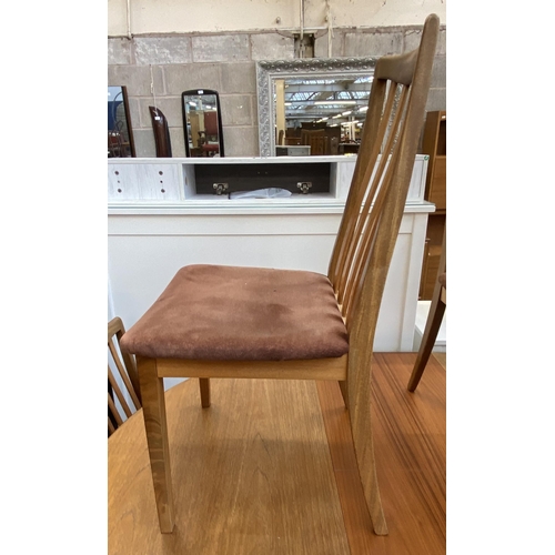 50 - A G Plan Fresco teak extending dining table and four chairs - approx. 73cm high x 121cm wide x 168cm... 