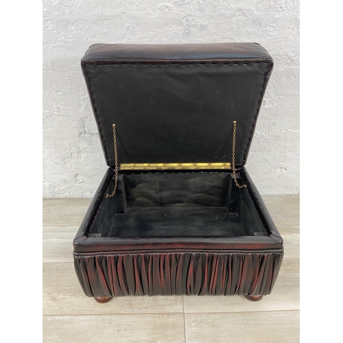 57 - An oxblood leather storage footstool - approx. 44cm high x 56cm wide x 42cm deep