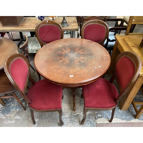 58 - An Italian style inlaid walnut effect circular pedestal dining table and four chairs