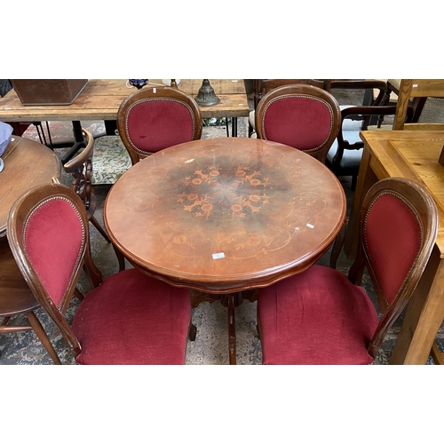 58 - An Italian style inlaid walnut effect circular pedestal dining table and four chairs