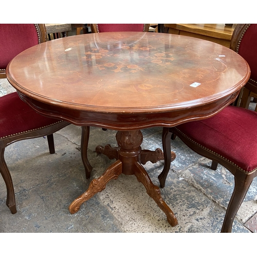 58 - An Italian style inlaid walnut effect circular pedestal dining table and four chairs