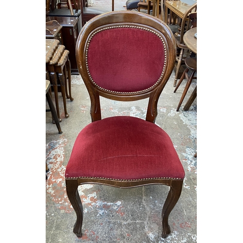 58 - An Italian style inlaid walnut effect circular pedestal dining table and four chairs