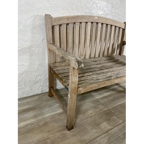 103 - A Lindsey Plantation teak garden bench - approx. 95cm high x 120cm wide x 62cm deep