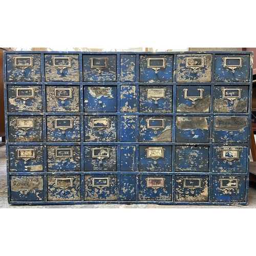 108 - A mid 20th century industrial blue painted wooden bank of drawers - approx. 60cm high x 94cm wide x ... 