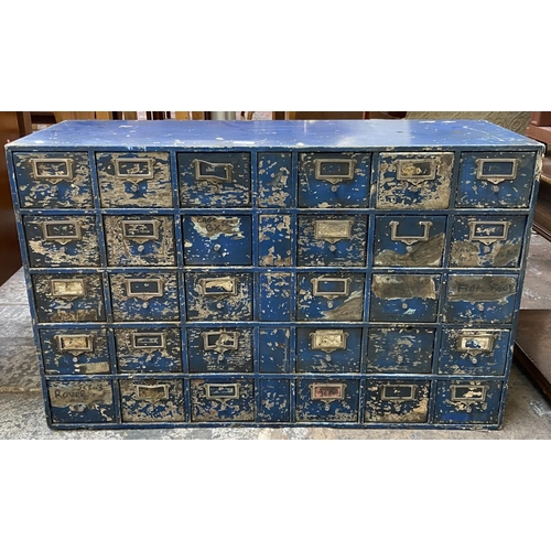 108 - A mid 20th century industrial blue painted wooden bank of drawers - approx. 60cm high x 94cm wide x ... 