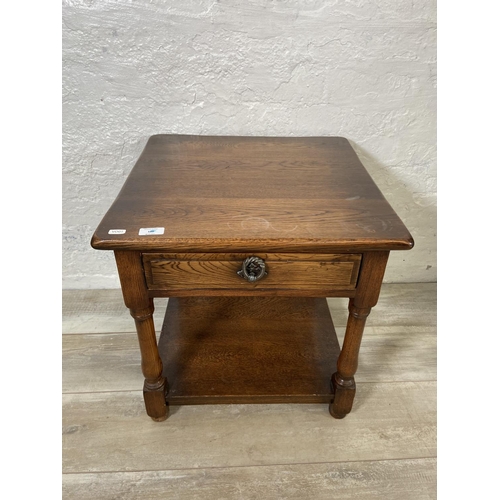 109 - Two pieces of furniture, one 17th century style oak side table and one 1970s plastic chest of drawer... 