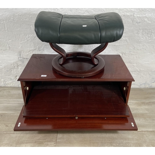 117 - Two pieces of furniture, one Ekornes Stressless green leather and bentwood footstool and one mahogan... 