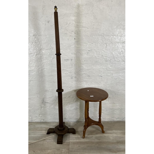 119 - Two pieces of furniture, one beech circular side table and one Art Deco oak standard lamp - approx. ... 