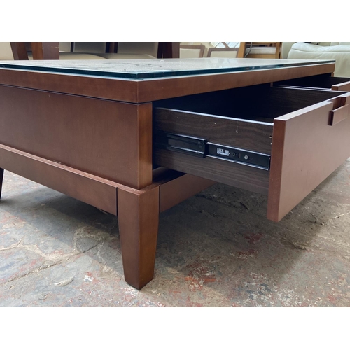 139 - A modern cherrywood rectangular two drawer coffee table - approx. 43cm high x 68cm wide x 132cm long