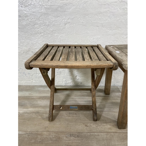 143 - Two pieces of Lindsey Plantation teak garden furniture, one side table and one folding side table