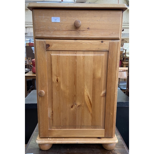 147 - A pine bedside cabinet - approx. 77cm high x 46cm wide x 40cm deep