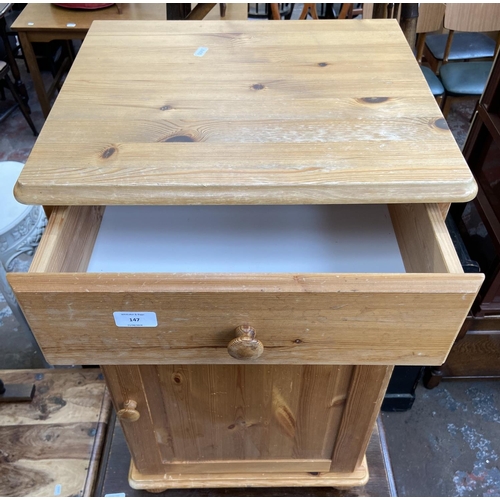 147 - A pine bedside cabinet - approx. 77cm high x 46cm wide x 40cm deep