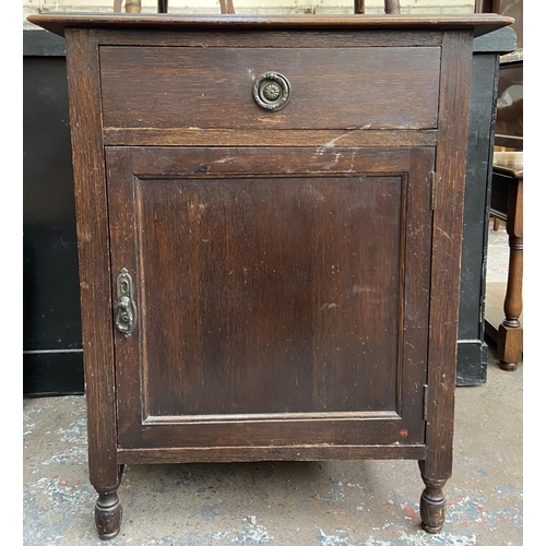 148 - An early 20th century oak bedside cabinet - approx. 80cm high x 60cm wide x 50cm deep