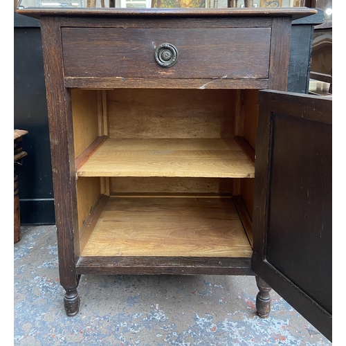 148 - An early 20th century oak bedside cabinet - approx. 80cm high x 60cm wide x 50cm deep