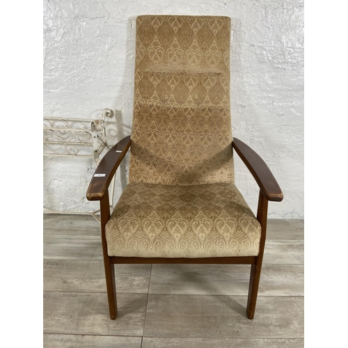 149 - Two pieces of furniture, one Parker Knoll PK1071-74 teak and fabric upholstered armchair and one whi... 