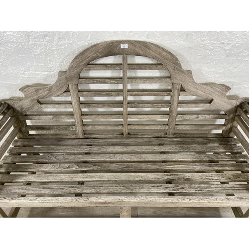 155 - A Lutyens style teak garden bench - approx. 104cm high x 163cm wide x 57cm deep