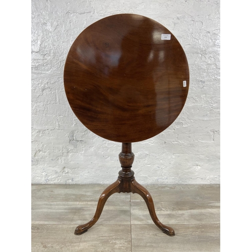 156 - A Georgian mahogany circular tilt top tripod occasional table - approx. 102cm high when tilted x 55c... 