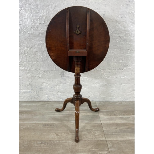 156 - A Georgian mahogany circular tilt top tripod occasional table - approx. 102cm high when tilted x 55c... 