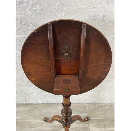 156 - A Georgian mahogany circular tilt top tripod occasional table - approx. 102cm high when tilted x 55c... 