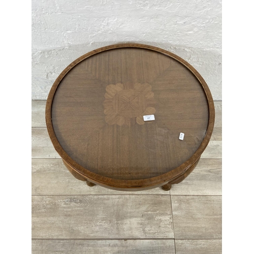 157 - An Art Deco style inlaid walnut circular coffee table - approx. 49cm high x 60cm diameter