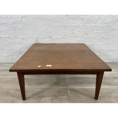 164 - A mid 20th century teak coffee table - approx. 34cm high x 74cm wide x 74cm deep