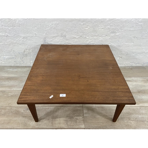 164 - A mid 20th century teak coffee table - approx. 34cm high x 74cm wide x 74cm deep