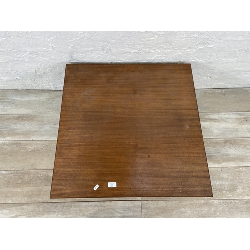 164 - A mid 20th century teak coffee table - approx. 34cm high x 74cm wide x 74cm deep