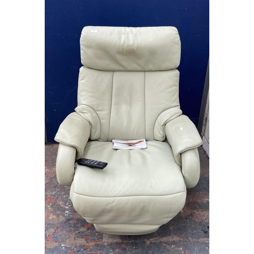 169 - A Himolla Cosyform Tobi green leather and beech electric reclining armchair with remote and instruct... 