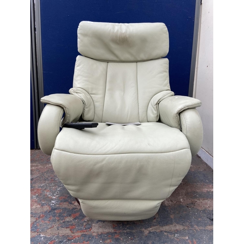 169 - A Himolla Cosyform Tobi green leather and beech electric reclining armchair with remote and instruct... 