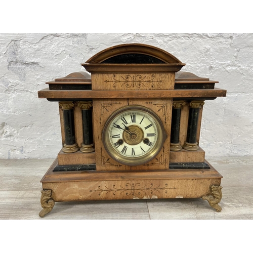 173 - A Victorian walnut cased 14 day strike mantel clock with gilt metal supports, pendulum and key - app... 