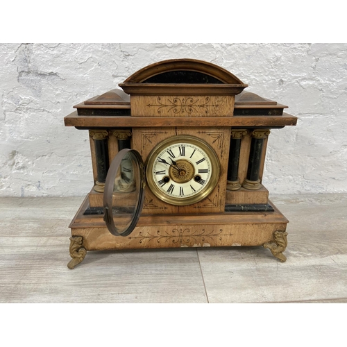 173 - A Victorian walnut cased 14 day strike mantel clock with gilt metal supports, pendulum and key - app... 